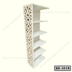 Modern white bookshelf with decorative carved side panel and five open shelves