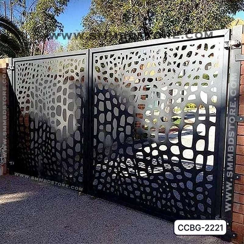 Modern CNC-cut metal boundary gate with abstract perforated design outdoors Main image