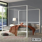 Modern white canopy bed frame in a stylish bedroom with gray walls and natural light