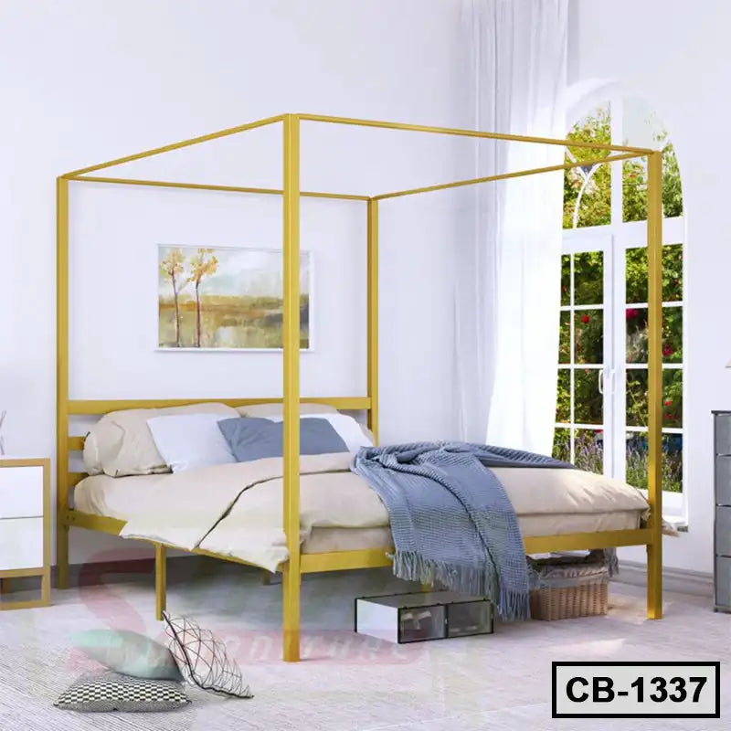 Modern yellow metal canopy bed frame in bright bedroom with large window and cozy decor Main image