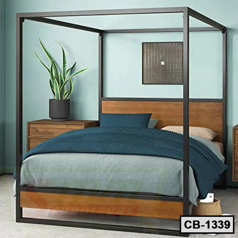 Modern canopy bed frame with wooden headboard, blue bedding, and bedside tables in a stylish bedroom Main image