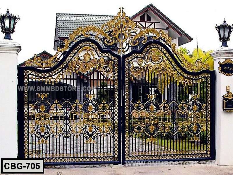 Decorative black and gold metal boundary gate with ornate patterns at a residential entrance Main image