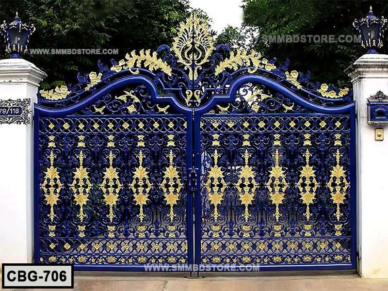 Ornate blue and gold metal boundary gate with decorative floral patterns, outdoor entrance Main image