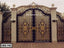 Decorative wrought iron boundary gate with gold accents and ornate patterns