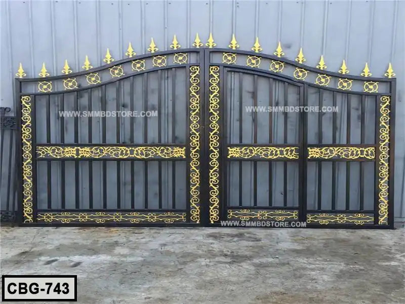 Decorative black and gold wrought iron gate with ornate patterns, ideal for modern exteriors. Main image