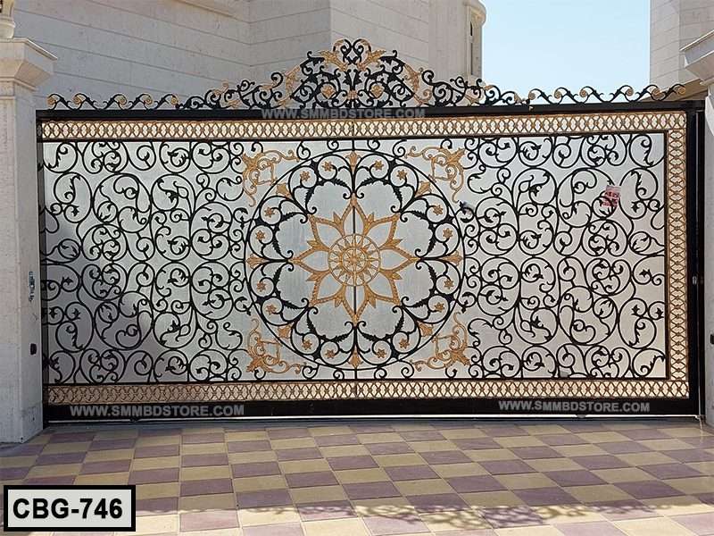 Decorative wrought iron boundary gate with intricate floral designs and gold accents