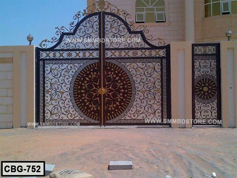 Decorative wrought iron boundary gate with intricate floral and geometric patterns for home exterior