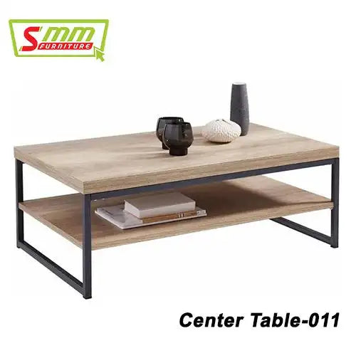 Modern wooden center table with black metal frame, open shelf, and minimalist decor items Main image