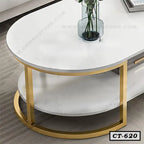 Modern white oval center table with gold metal frame and lower shelf in living room
