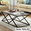Modern wooden center table with black geometric metal legs in a cozy living room setting