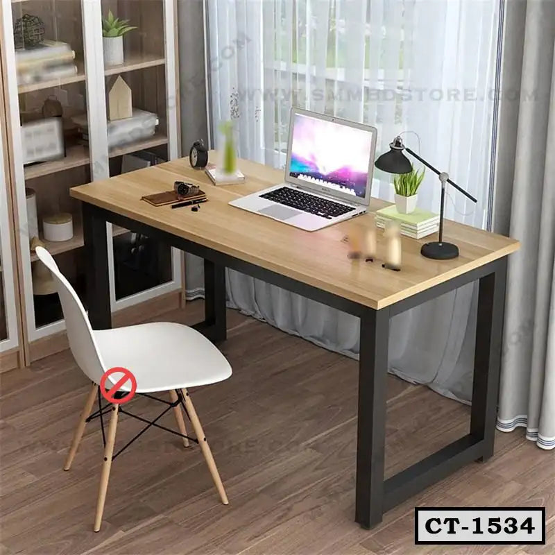 Modern wooden computer table with black metal legs, laptop, lamp, and white chair in home office