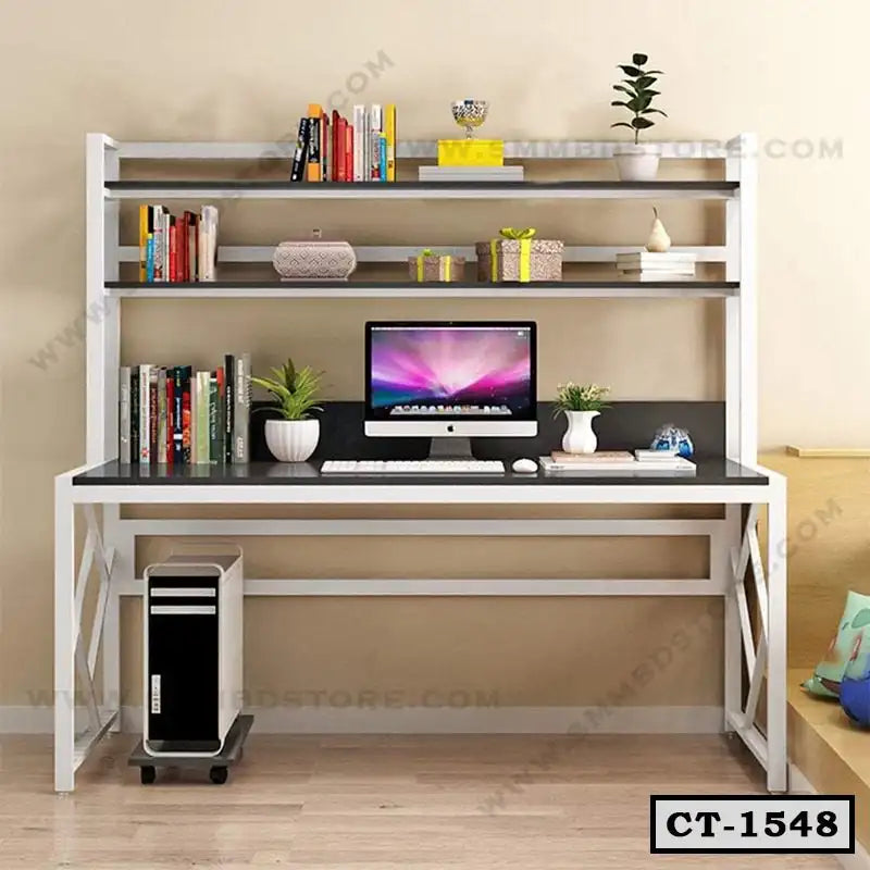 Modern computer table with shelves, desktop PC, books, plants, and decorative items