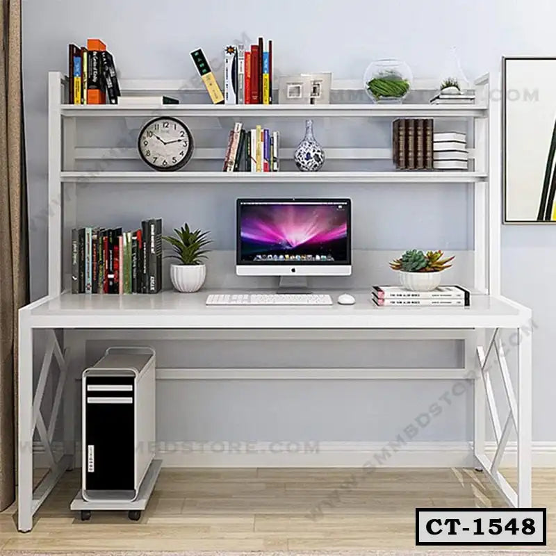 Modern computer table with bookshelves, desktop computer, plants, and storage shelves