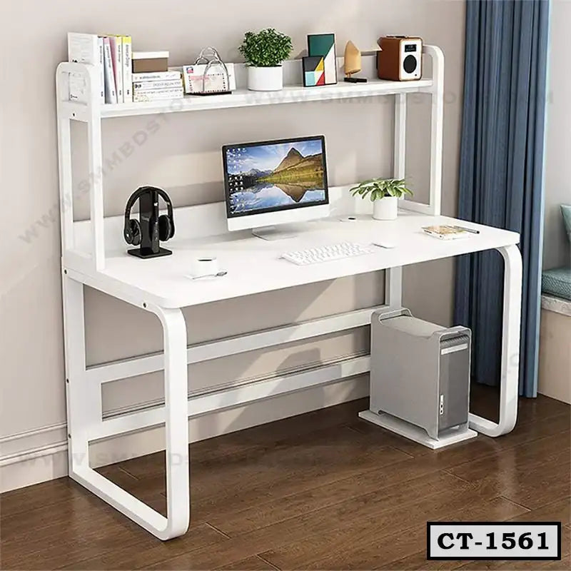 Modern white computer desk with shelf, monitor, keyboard, books and decor for home office