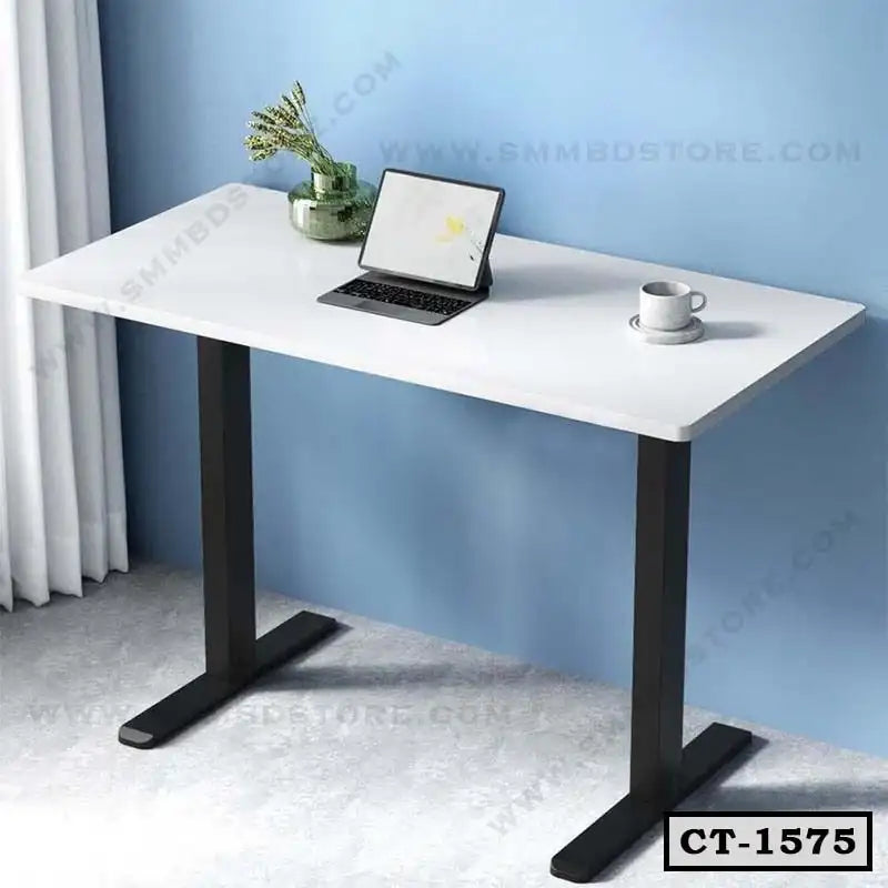 Modern white computer table with black metal legs, laptop, cup, and vase in home office setting Main image