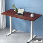 Modern computer table with wooden top, white metal legs, laptop, cup, and plant decor