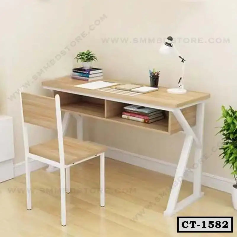 Modern wooden computer table with storage shelves, matching chair, books, lamp, and indoor plant. Main image