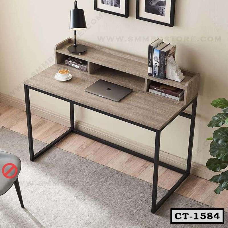 Wooden computer table with black metal frame, top shelf, and open storage compartments in a modern home office setting. Main image