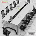Modern conference table with black chairs, laptops, and vase on marble floor