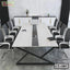 Modern conference table with black chairs in a stylish meeting room setting