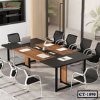 Modern conference table with black and wood finish, surrounded by mesh office chairs in meeting room