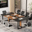 Modern conference table with black and wood finish, surrounded by mesh office chairs in meeting room