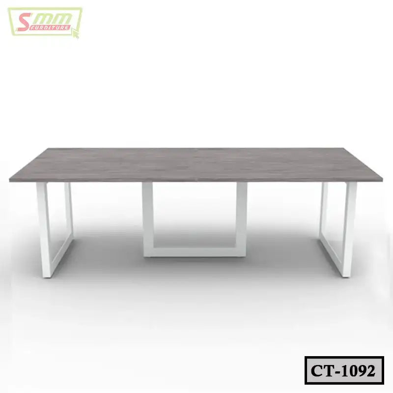 Modern rectangular conference table with white metal legs and wooden tabletop