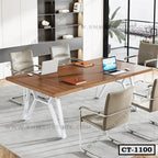 Modern office conference table with wooden top, white metal legs, and beige chairs