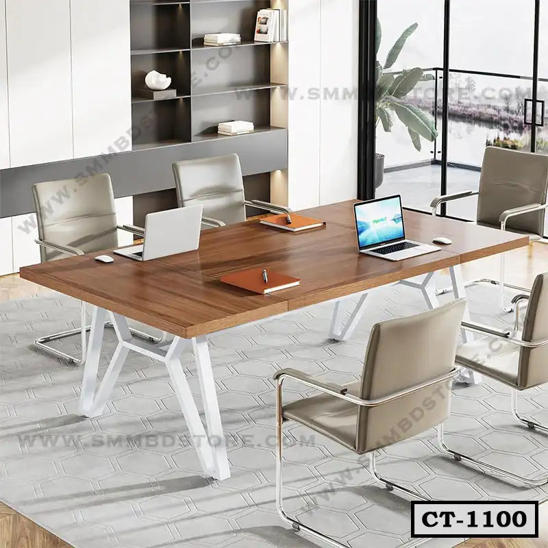 Modern office conference table with wooden top, white metal legs, and beige chairs