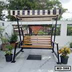 Outdoor metal and wood patio swing with canopy, surrounded by potted plants on a rooftop