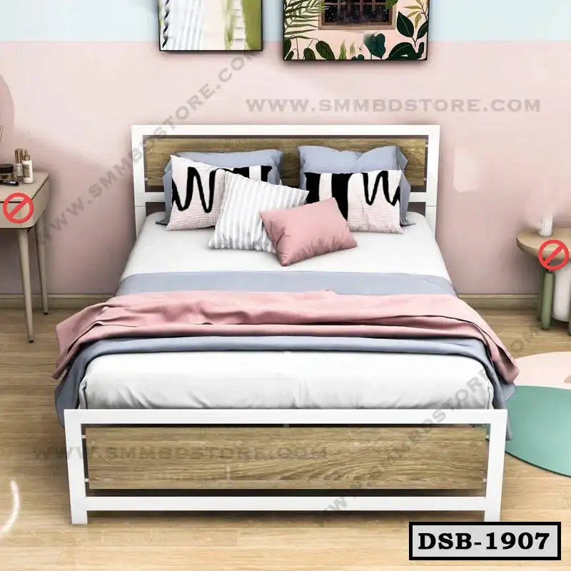 Modern double steel bed with wooden panels, pastel bedding, throw pillows, and bedside tables