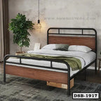 Modern double steel bed with wood panels in a stylish bedroom, indoor plant and pendant light