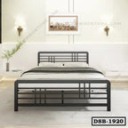 Modern double steel bed with geometric headboard in a minimalist bedroom setting