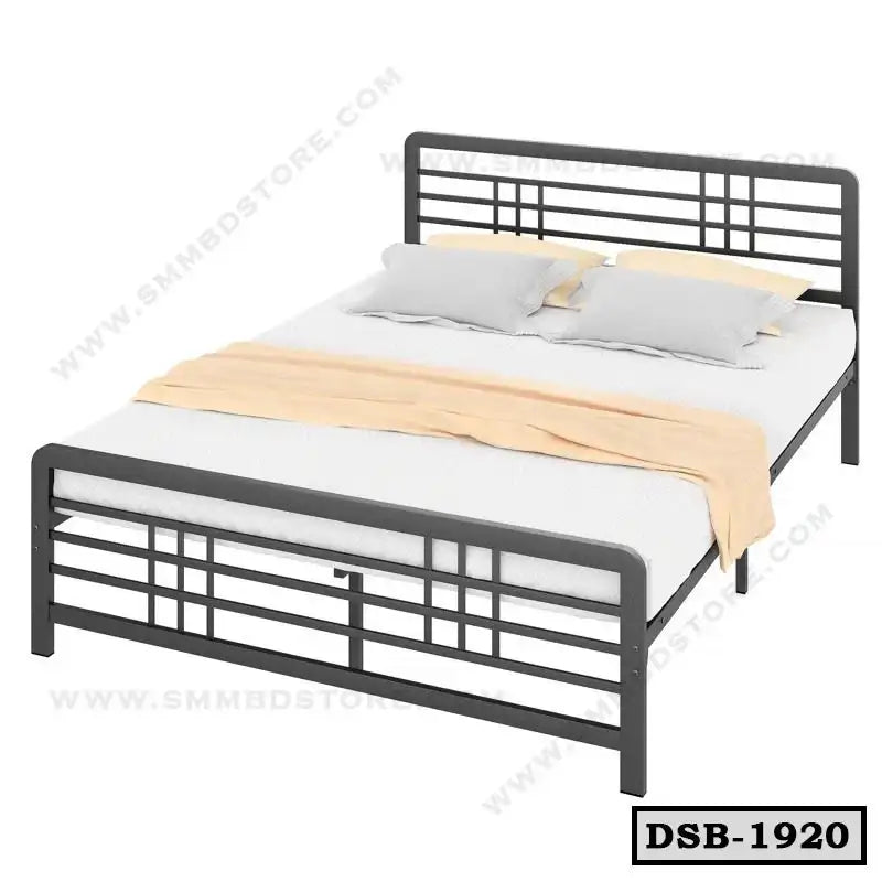 Modern double steel bed with black frame, white mattress, and light bedding