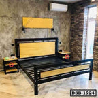 Modern double steel bed frame with wood panels in a contemporary bedroom setting.