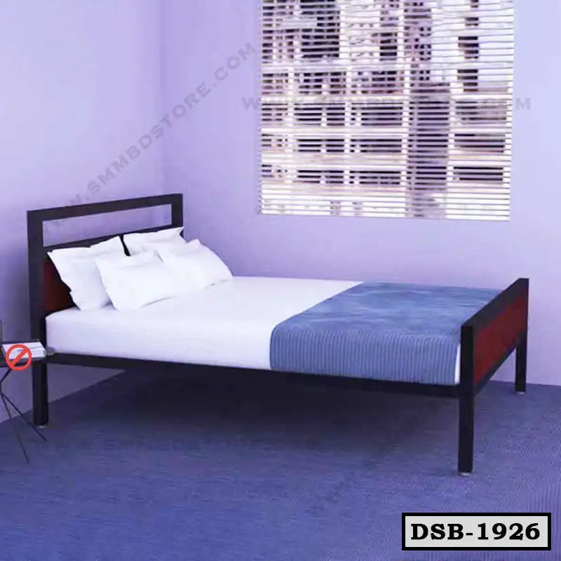 Modern double steel bed with white bedding in a purple bedroom, model DSB-1926.