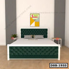 Modern double steel bed with green tufted headboard in a minimalist bedroom