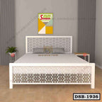 Modern double steel bed with white geometric lattice headboard and footboard in a minimalist bedroom