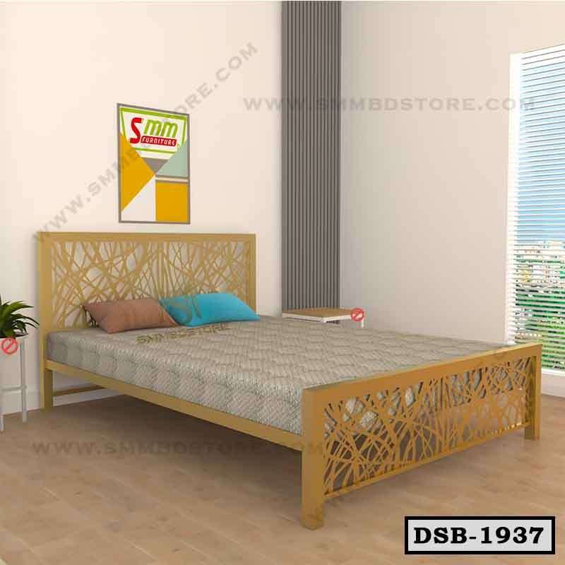 Modern double steel bed with abstract headboard design in a bright bedroom setting.