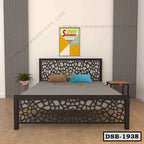 Modern double steel bed with decorative geometric headboard in a minimal bedroom