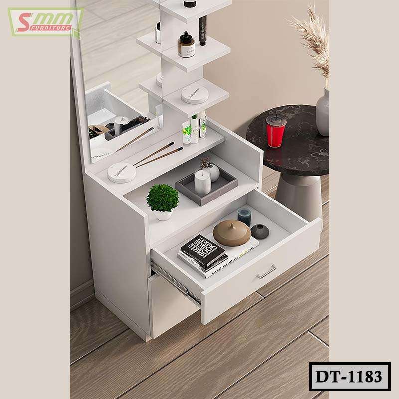 Modern white dressing table with mirror, open drawers, shelves, and makeup accessories