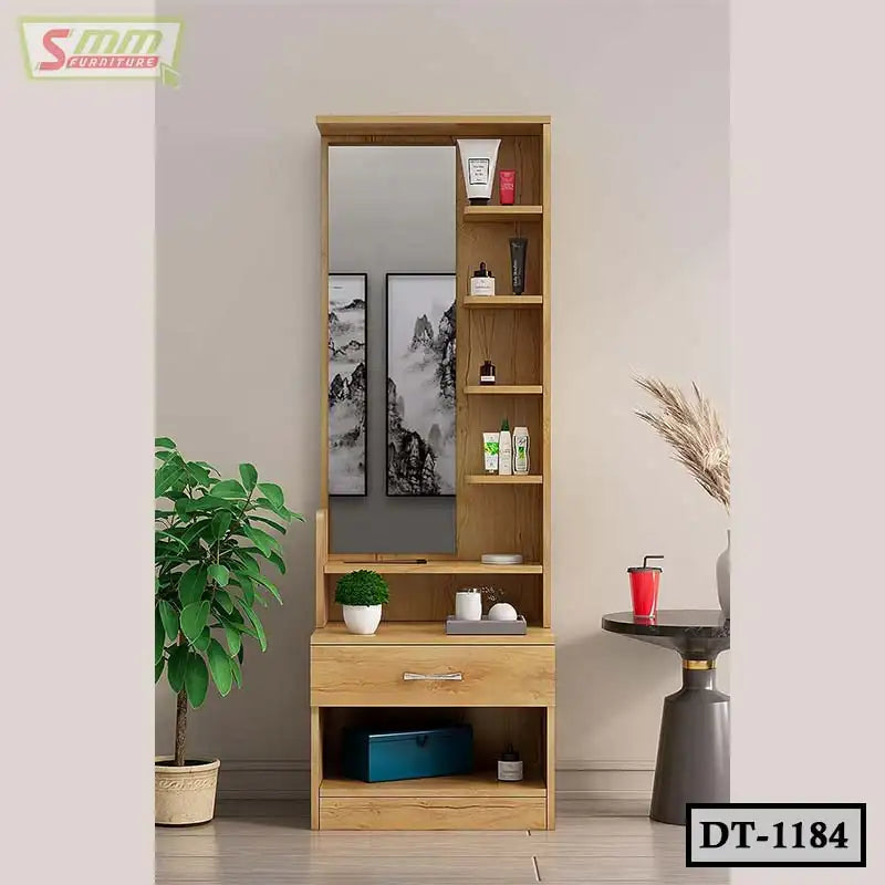 Wooden dressing table with mirror, shelves, drawer, and modern decor in a bedroom setting
