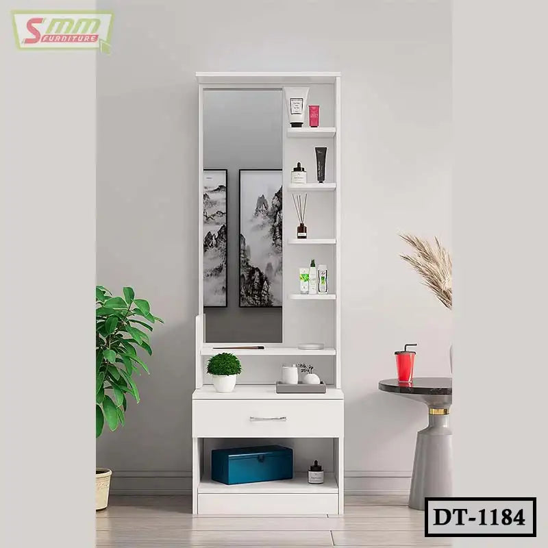 Modern white dressing table with mirror, open shelves, and drawer in a stylish room setting