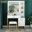 Modern white and gold dressing table with mirror, lights, stool, and storage shelves