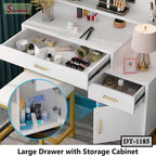 White dressing table with large drawers, storage cabinet, and beauty accessories displayed