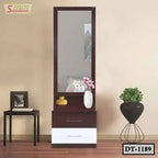 Modern wooden dressing table with large mirror, drawers, and decorative vases in a bedroom setting