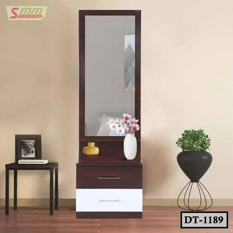 Modern wooden dressing table with large mirror, drawers, and decorative vases in a bedroom setting
