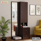 Modern dark wood dressing table with mirror, storage drawers, and display shelf in a bedroom