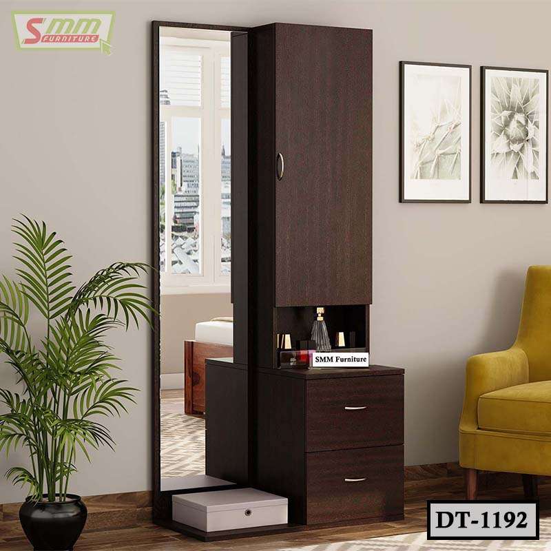Modern dark wood dressing table with mirror, storage drawers, and display shelf in a bedroom