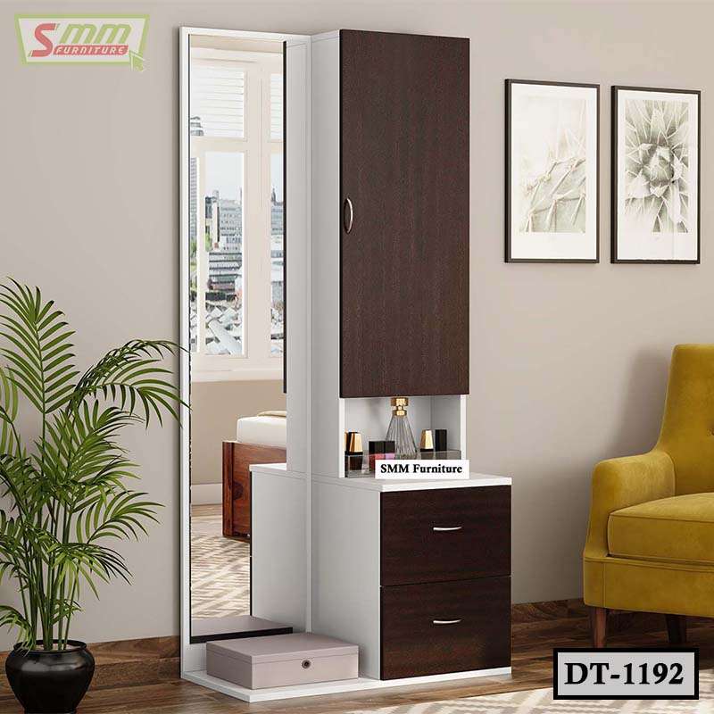 Modern wooden dressing table with full-length mirror, drawers, and indoor plant in a living room
